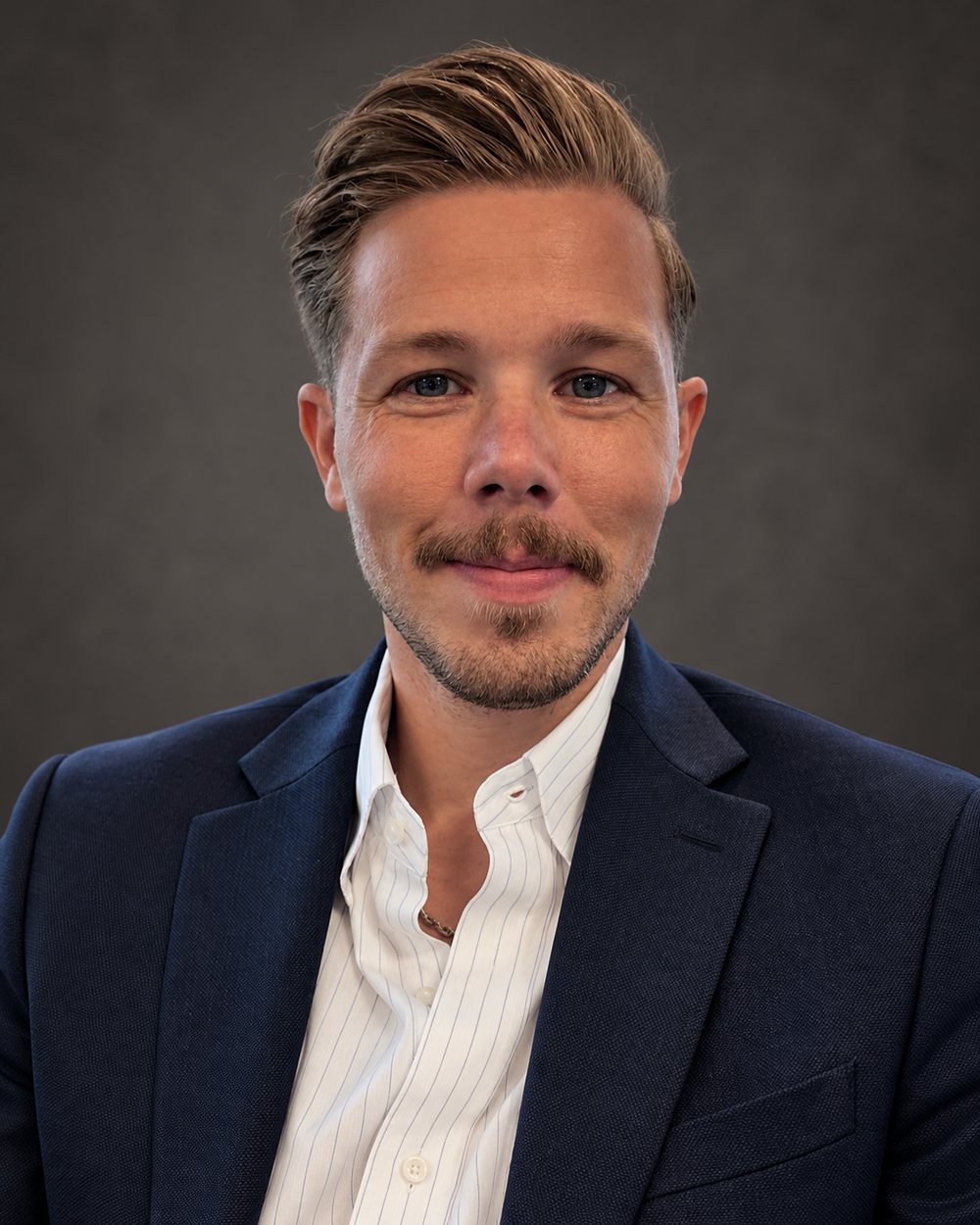 Portrait of Micah Cartee, founder of Cartee Consulting